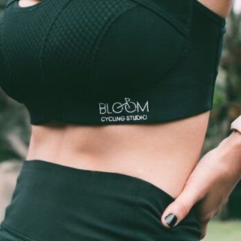 woman in black sports bra and black pants